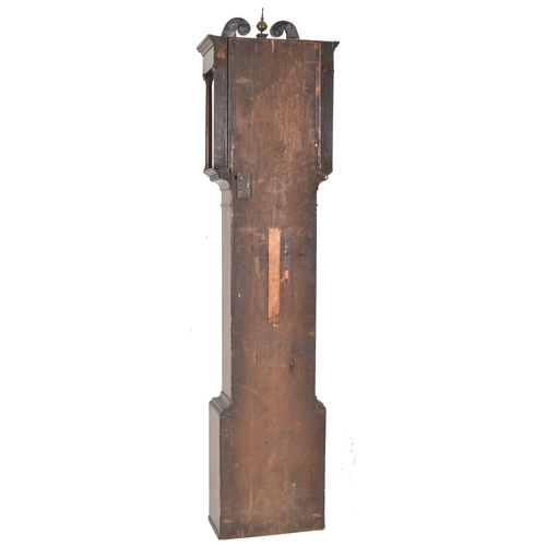 514 - A 19th century flame mahogany cased eight-day movement longcase clock. The clock having c-scrolled c... 