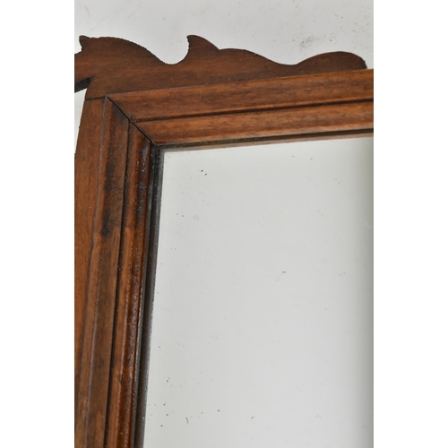 519 - A 19th century mahogany fret-work Chippendale inspired pier wall hanging mirror. The mirror having c... 