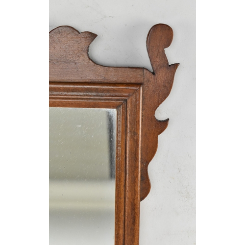 519 - A 19th century mahogany fret-work Chippendale inspired pier wall hanging mirror. The mirror having c... 