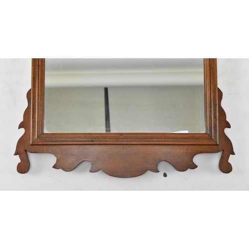 519 - A 19th century mahogany fret-work Chippendale inspired pier wall hanging mirror. The mirror having c... 