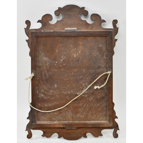 519 - A 19th century mahogany fret-work Chippendale inspired pier wall hanging mirror. The mirror having c... 