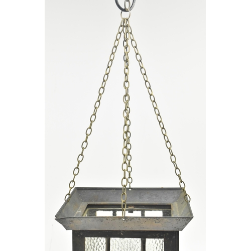 527 - An Arts & Crafts early 20th century copper toned metal and textured glass lantern porch hanging ... 