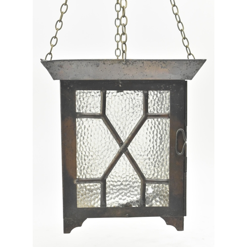 527 - An Arts & Crafts early 20th century copper toned metal and textured glass lantern porch hanging ... 