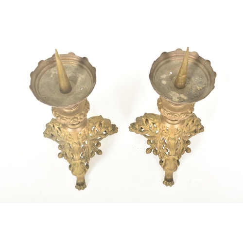 530 - A pair of believed French 19th century brass ecclesiastic altar princkets candlesticks. Each having ... 