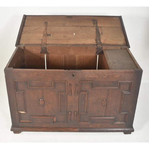 532 - An early 18th century carved oak block fronted coffer / blanket box chest. The coffer having a flare... 