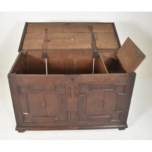 532 - An early 18th century carved oak block fronted coffer / blanket box chest. The coffer having a flare... 