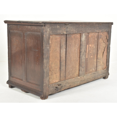 532 - An early 18th century carved oak block fronted coffer / blanket box chest. The coffer having a flare... 