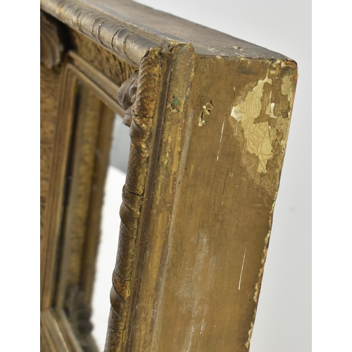 534 - A 19th century Victorian gilt and gesso cassetta hall mirror. The mirror of squared form having a ri... 