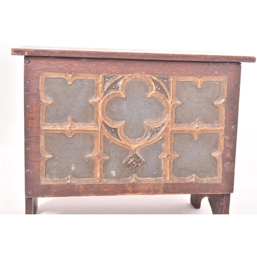 536 - Manner of Pugin - A Gothic late 19th century carved oak painted ecclesiastical decorated coffer. The... 