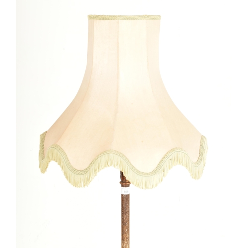 558 - A French Empire inspired painted wood chinoiserie effect floor standard lamp light. The lamp having ... 