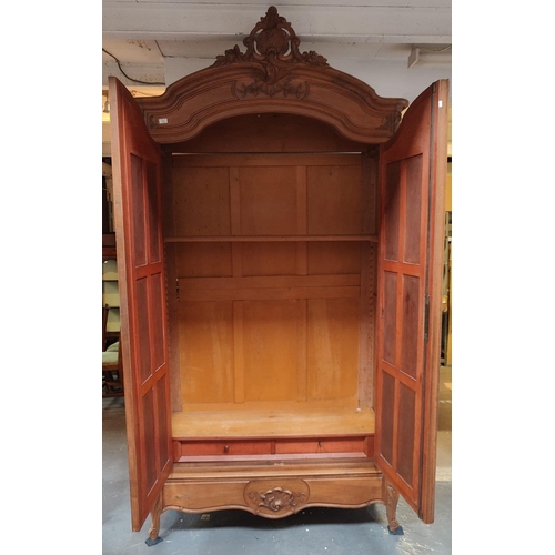 559 - A French 19th century Louis XV style kingwood mirror front armoire wardrobe. The wardrobe having a c... 