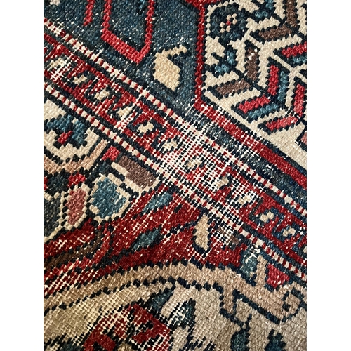 571 - An early 20th century Persian Islamic Bakhtiari hand woven floor carpet rug. The rug having a centra... 