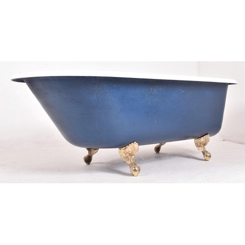 583 - A contemporary Victorian style roll top bath / bathtub. The tub of typical form having a white ename... 