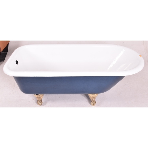 583 - A contemporary Victorian style roll top bath / bathtub. The tub of typical form having a white ename... 