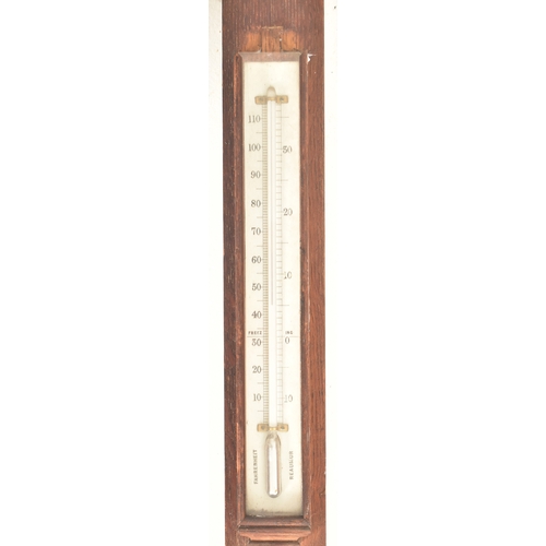 427 - A George III 18th century M. Pillischer of London stick wall barometer. The barometer in oak case wi... 