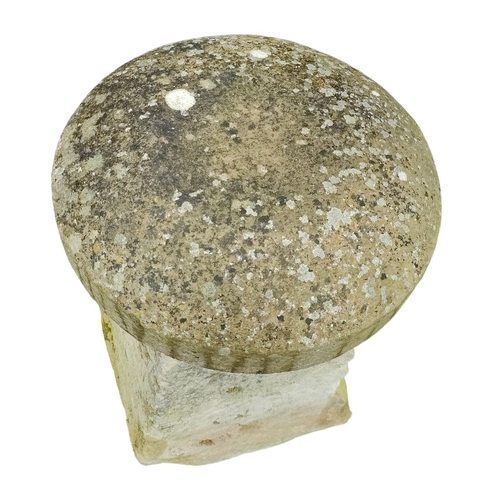 476 - An original 18th / 19th cenutry carved stone staddle stone base with a reconstituted stone top. The ... 