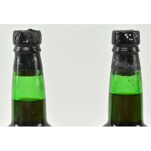 199 - Two Lomelino Dona Maria very rare old Malmsey Sweet Madeira wine bottles. By special appointment to ... 