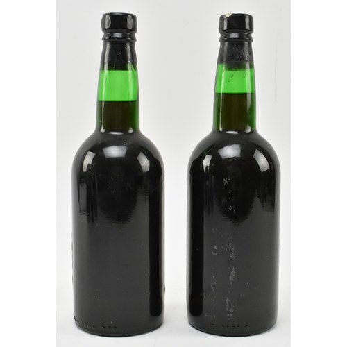 199 - Two Lomelino Dona Maria very rare old Malmsey Sweet Madeira wine bottles. By special appointment to ... 