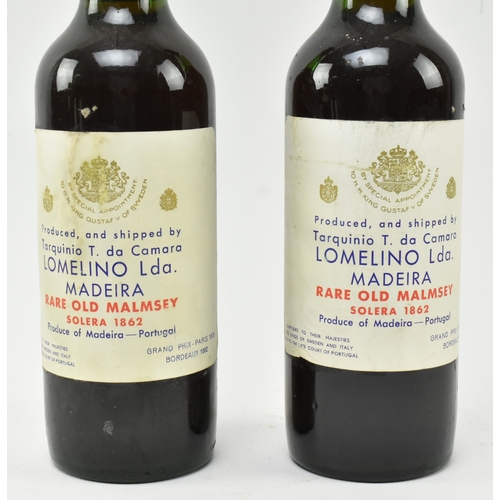 203 - Two 1862 Solera Rare Old Malmsey Madeira Lomelino wine bottles. Produced and shipped by Tarquinio T.... 