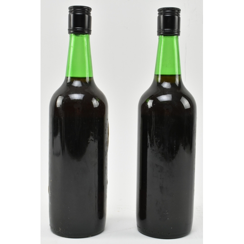 203 - Two 1862 Solera Rare Old Malmsey Madeira Lomelino wine bottles. Produced and shipped by Tarquinio T.... 