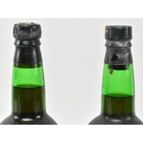 204 - Two Lomelino Dona Maria very rare old Malmsey Sweet Madeira wine bottles. By special appointment to ... 