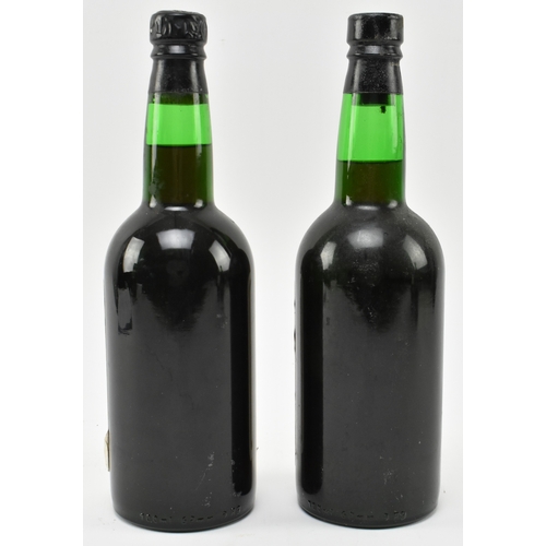 204 - Two Lomelino Dona Maria very rare old Malmsey Sweet Madeira wine bottles. By special appointment to ... 