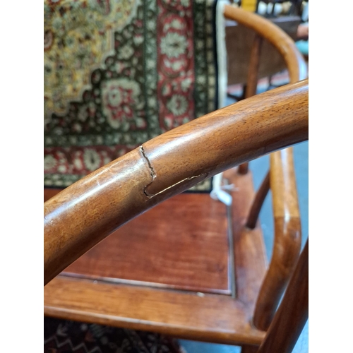 355 - A three piece suite of Chinese Huanghuali wood horseshoe three seater bench and pair of armchairs. E... 