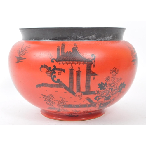 110 - Pountney & Co - An early 20th century Bristol chinoiserie pottery planter, in red and black colo... 