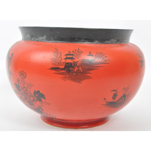 110 - Pountney & Co - An early 20th century Bristol chinoiserie pottery planter, in red and black colo... 