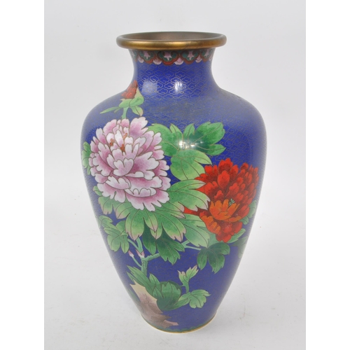 13 - A vintage 1920s blue enamel cloisonne vase, decorated to the main body with pink and red flowers and... 