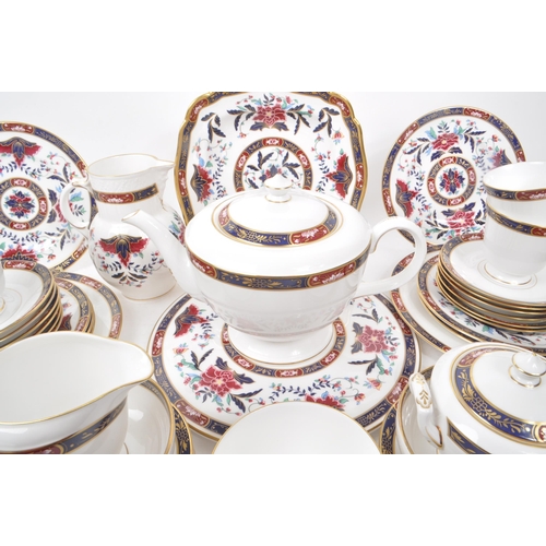 137 - Royal Worcester - Prince Regent - A collection of 1994 tea service pieces, including a teapot, cups,... 