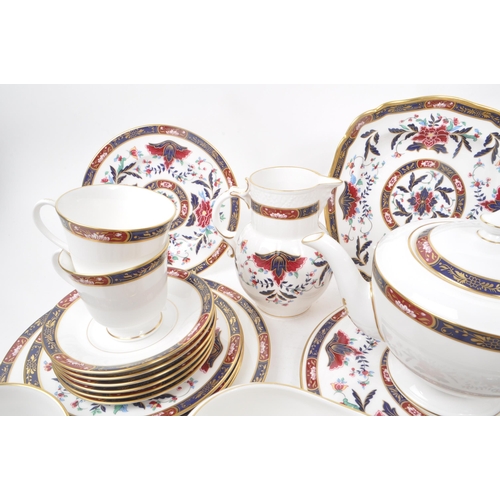 137 - Royal Worcester - Prince Regent - A collection of 1994 tea service pieces, including a teapot, cups,... 