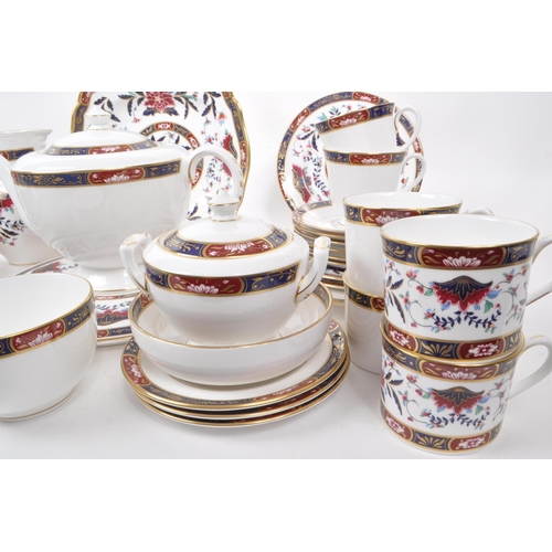 137 - Royal Worcester - Prince Regent - A collection of 1994 tea service pieces, including a teapot, cups,... 