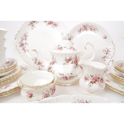 140 - Royal Albert - Lavender Rose - A collection of 1961 bone china tea service pieces, including a teapo... 