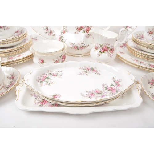 140 - Royal Albert - Lavender Rose - A collection of 1961 bone china tea service pieces, including a teapo... 