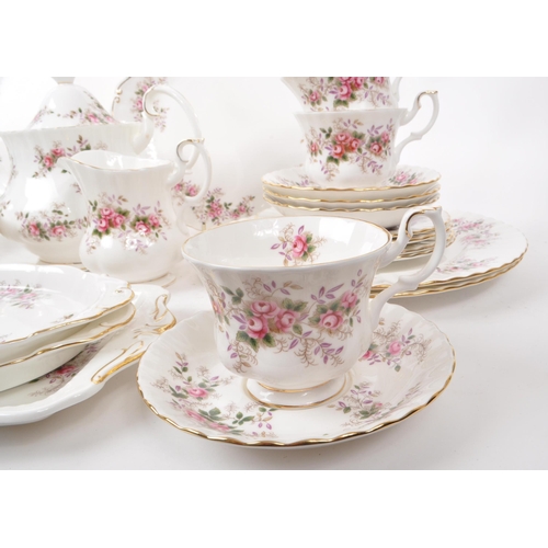 140 - Royal Albert - Lavender Rose - A collection of 1961 bone china tea service pieces, including a teapo... 