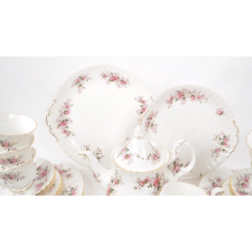 140 - Royal Albert - Lavender Rose - A collection of 1961 bone china tea service pieces, including a teapo... 