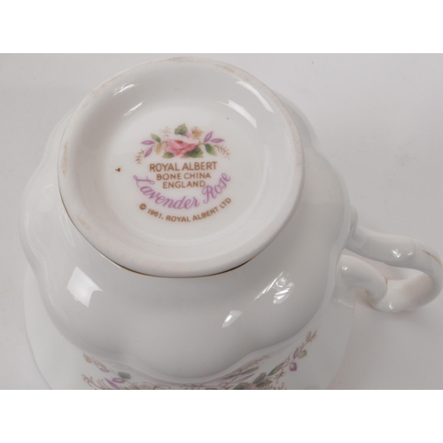 140 - Royal Albert - Lavender Rose - A collection of 1961 bone china tea service pieces, including a teapo... 