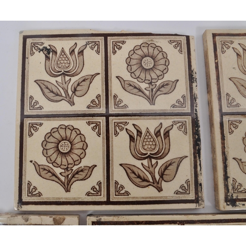 145 - A collection of ten Victorian aesthetic period ceramic tiles, featuring brown and cream-coloured flo... 