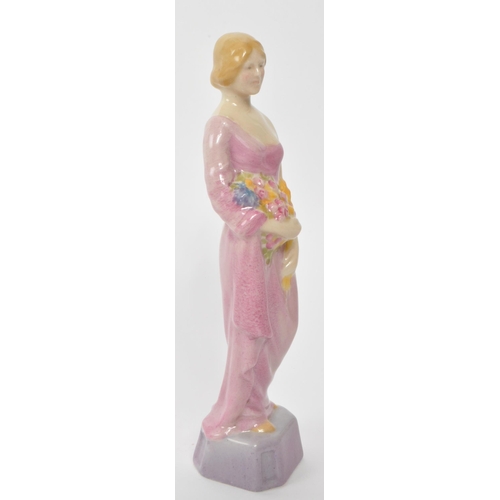 162 - Royal Doulton - An early 20th century 1902 - 1920 Royal Doulton HN314 Autumn porcelain figure. The f... 