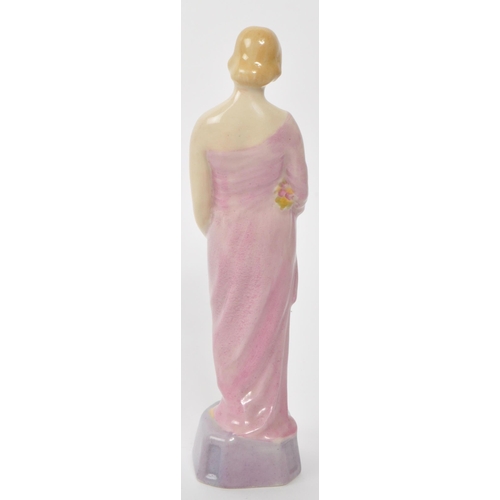 162 - Royal Doulton - An early 20th century 1902 - 1920 Royal Doulton HN314 Autumn porcelain figure. The f... 