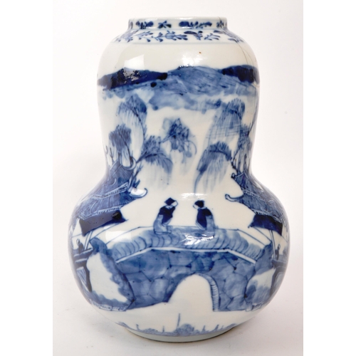 167 - A Chinese 19th century blue and white porcelain china vase. Depicinting a mountain side, with pagoda... 