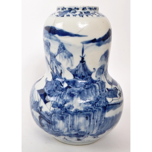 167 - A Chinese 19th century blue and white porcelain china vase. Depicinting a mountain side, with pagoda... 