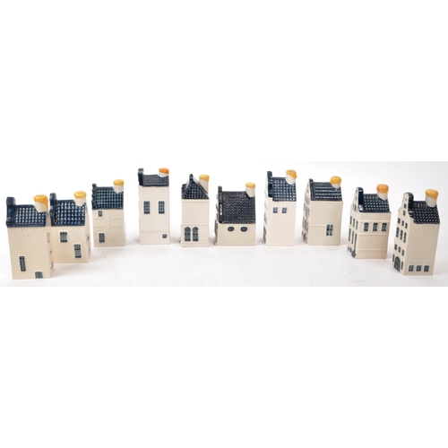 171 - KLM - BOLS - A collection of ten late 20th-century Blue Delft miniature liquor houses, sealed with w... 