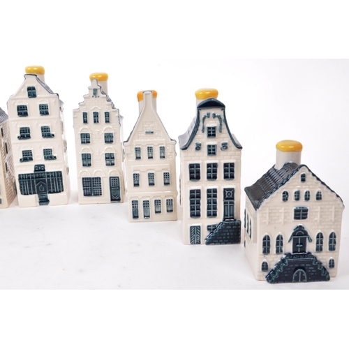 174 - KLM - BOLS - A collection of ten late 20th-century Blue Delft miniature liquor houses, sealed with w... 