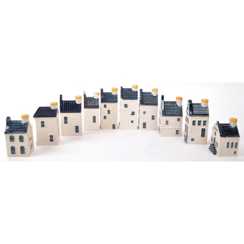 174 - KLM - BOLS - A collection of ten late 20th-century Blue Delft miniature liquor houses, sealed with w... 