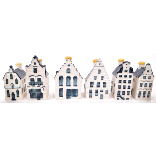 175 - KLM - BOLS - A collection of ten late 20th-century Blue Delft miniature liquor houses, sealed with w... 