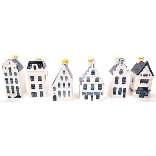 179 - KLM - BOLS - A collection of ten late 20th-century Blue Delft miniature liquor houses, sealed with w... 