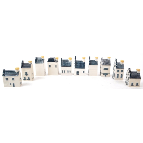 179 - KLM - BOLS - A collection of ten late 20th-century Blue Delft miniature liquor houses, sealed with w... 