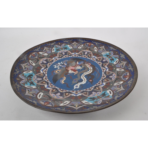 18 - A vintage early 20th century Japanese cloisonne metal dish. Decorated in blue, purple and red colour... 